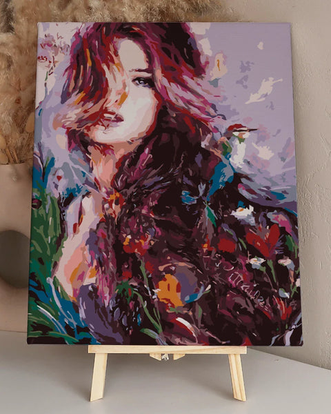 Expressive portrait painting of a woman with flowing colorful hair