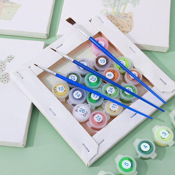 Contents of the Plant Parenthood Paint by Numbers Kit by Artspark, including canvases (6x6 inches / 15x15 cm), paints, brushes, and layout guide.