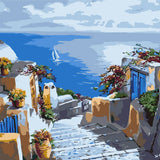 Greek coastal village painting with white houses, blue doors, and sea