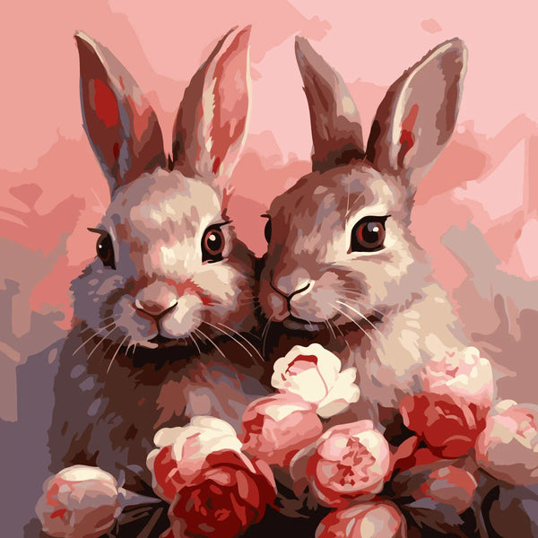 Two adorable rabbits surrounded by pink and red blooming flowers