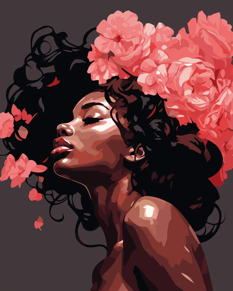 Woman with dark curly hair adorned with vibrant pink roses
