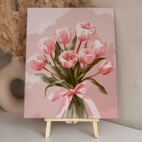 A bouquet of pink tulips tied with a delicate ribbon