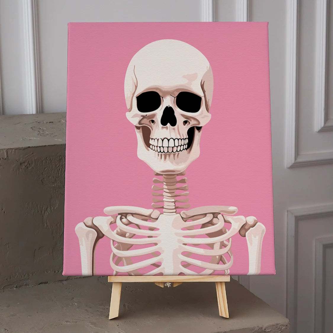 A detailed skeleton with a pink background and a grin
