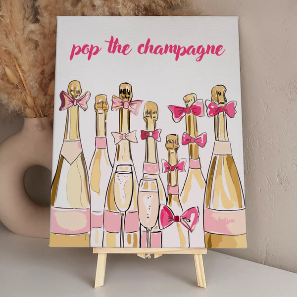 Elegant champagne bottles with pink bows and celebratory text