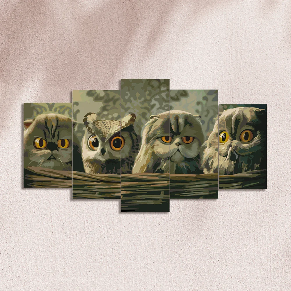 Painting of cats and an owl with intense orange eyes
