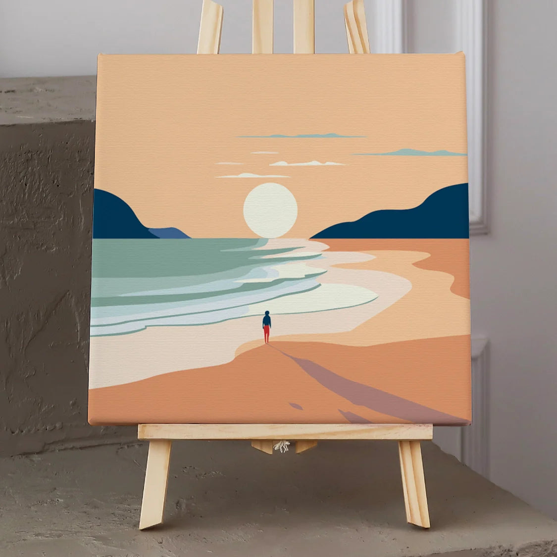 Person walking on a sandy beach towards the sunset over ocean