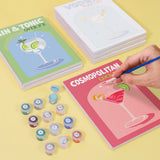 Painting a Cosmopolitan cocktail canvas from the Cocktail Cuties Paint by Numbers Kit by Artspark - Complete with paints, brushes, and numbered linen canvases.