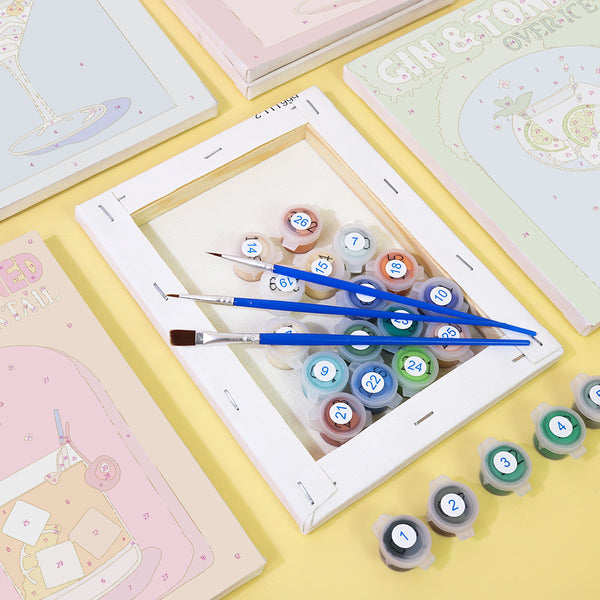 Cocktail Cuties Paint by Numbers Kit by Artspark - Includes canvas frames, brushes, numbered paints, and cocktail-themed designs for painting.