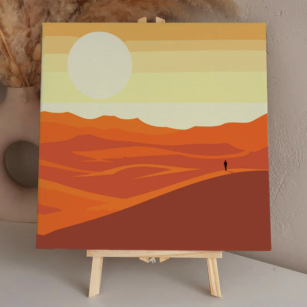 Minimalist desert landscape with a lone traveler under a large sun