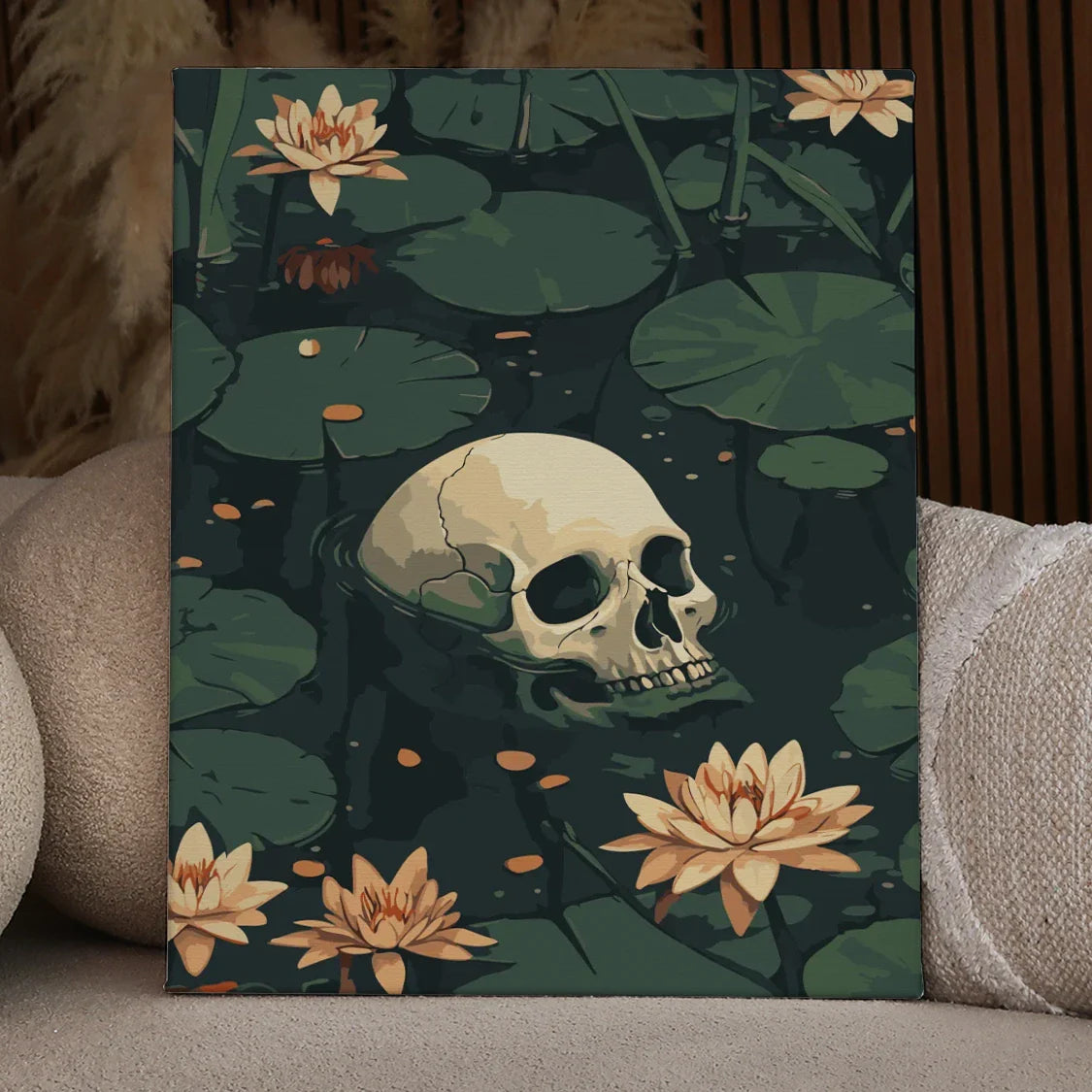 Skull submerged in a dark lily pond surrounded by blooming water lilies, featured in the Drowned Echoes paint by numbers kit.