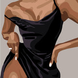 Elegant woman in a black dress striking a confident pose