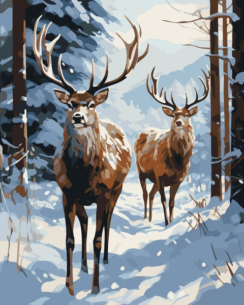 Two majestic deer standing in a snowy winter forest scene