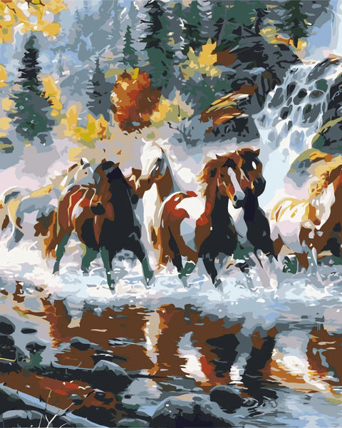 Wild horses galloping through a river with waterfall and autumn trees
