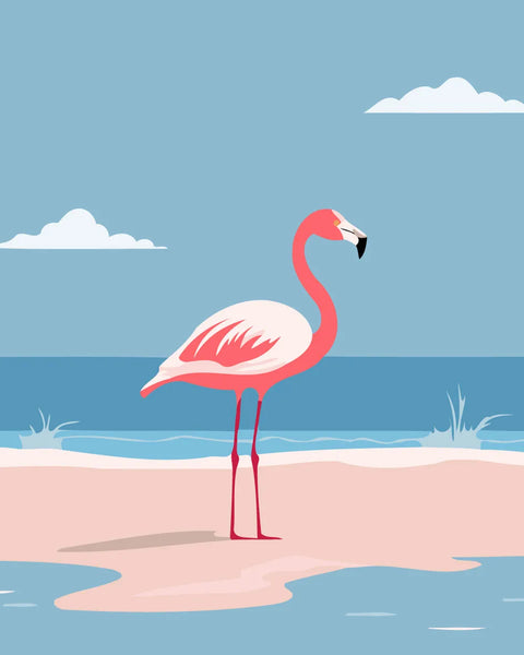 Pink flamingo standing on a sandy beach with ocean waves