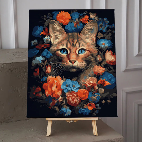 Realistic cat portrait surrounded by vibrant blue and orange flowers
