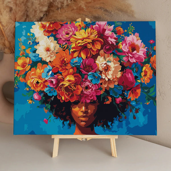 Vibrant portrait of a woman with blooming flowers as hair