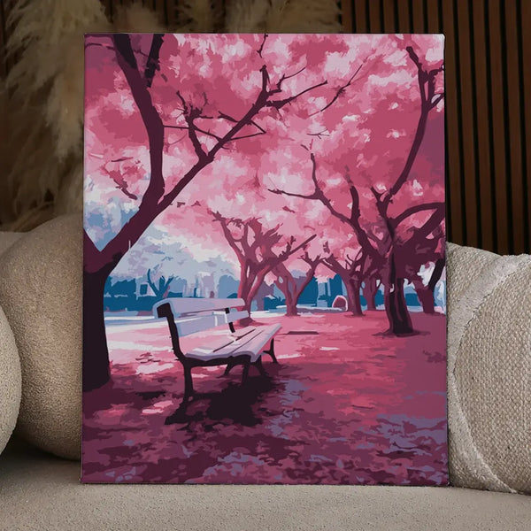 Serene park scene with cherry blossom trees and empty bench