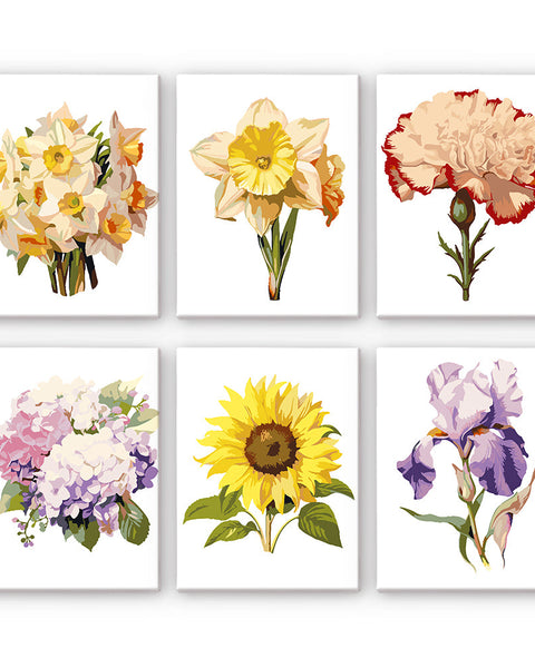 Collection of six floral canvas paintings featuring daffodils, carnations, hydrangeas, sunflowers, and irises. Garden Whispers Paint by Numbers Set by Artspark.