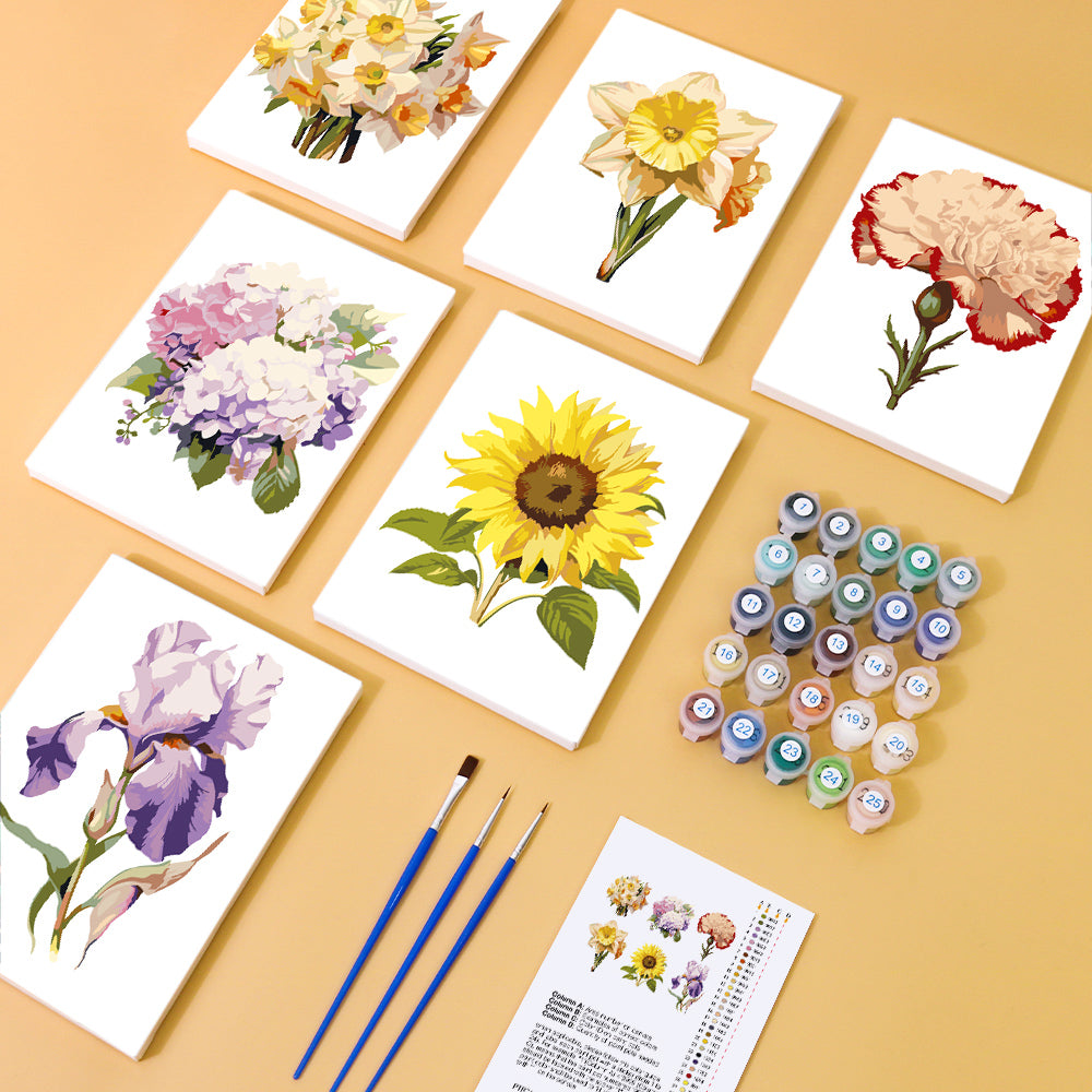 Garden Whispers Paint by Numbers Set featuring six floral canvases with daffodils, carnations, hydrangeas, sunflowers, and irises, along with paintbrushes, acrylic paints, and painting guide – Artspark Paint by Numbers.