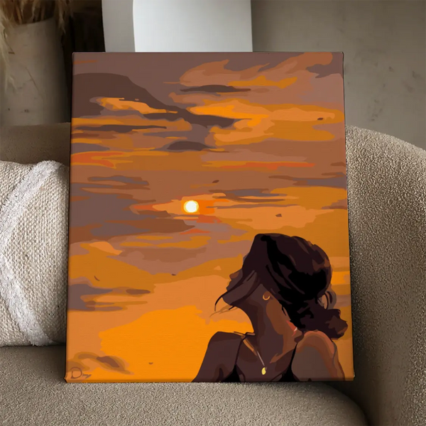 Painting of a woman watching the sunset with warm colors