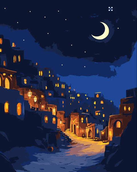 A peaceful hillside village illuminated by warm golden lanterns under a crescent moon, featured in the Homes of Devotion paint by numbers kit.