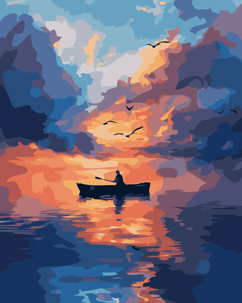 Silhouette of a person rowing a boat on a sunset-lit lake