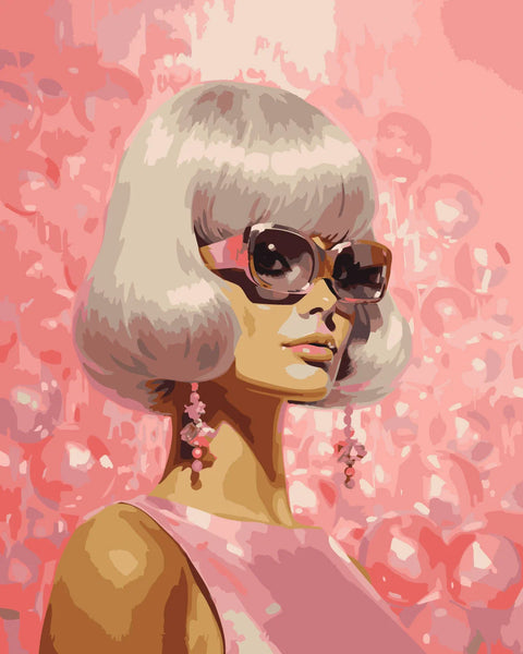 Stylish woman with blonde bob haircut wearing sunglasses and earrings