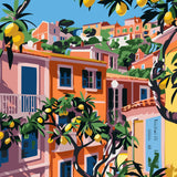 Vibrant Mediterranean village with colorful houses and lemon trees