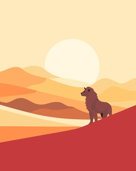 A lion standing on a hill against a desert sunset