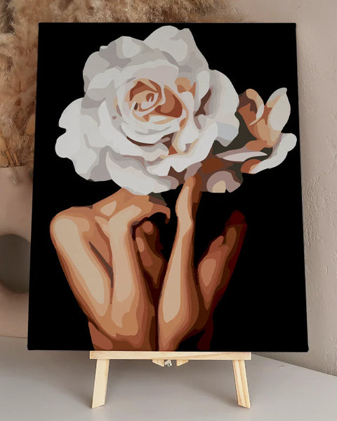 Surreal painting of hands holding a white rose as a face