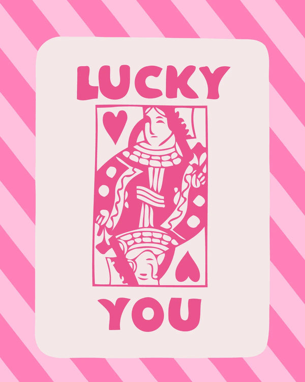 Pink queen of hearts playing card with "Lucky You" text