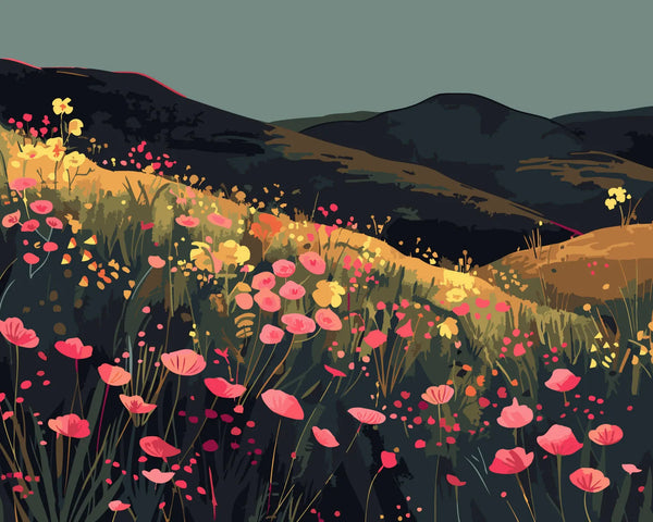 Colorful wildflower field on rolling hills with dark mountains
