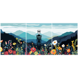 Skeleton standing in a colorful wildflower field with mountain backdrop