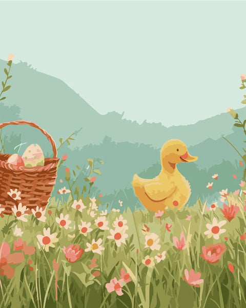 Cute yellow duckling in a flower meadow with Easter basket