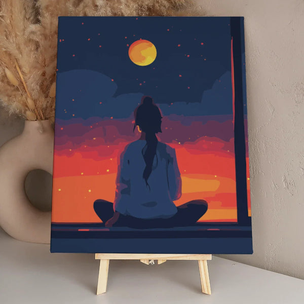 Woman sitting by window watching sunset and moonrise sky