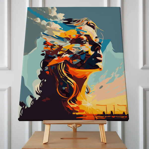 Abstract portrait of a woman blending with a vibrant sunset