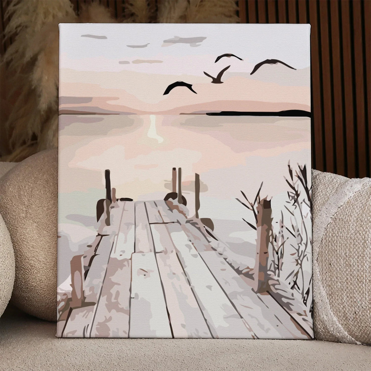 Painting of a wooden pier at sunset with flying birds