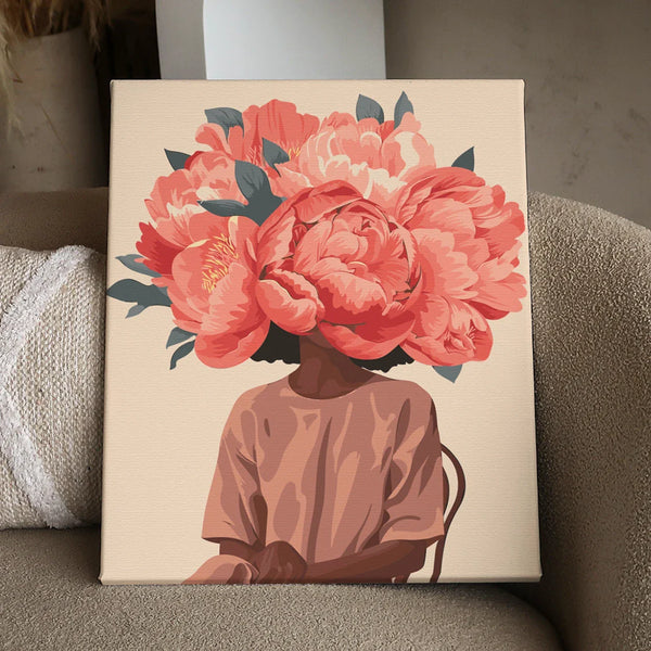 Elegant portrait of a woman with blooming coral peony head