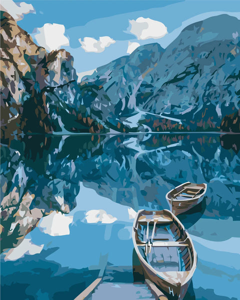 Scenic lake painting with wooden boats and mountain reflections