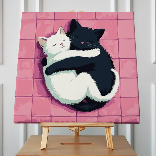 Painting of black and white cats hugging in yin-yang pose