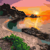 Beach sunset painting with rocky shore, calm water, and vibrant sky