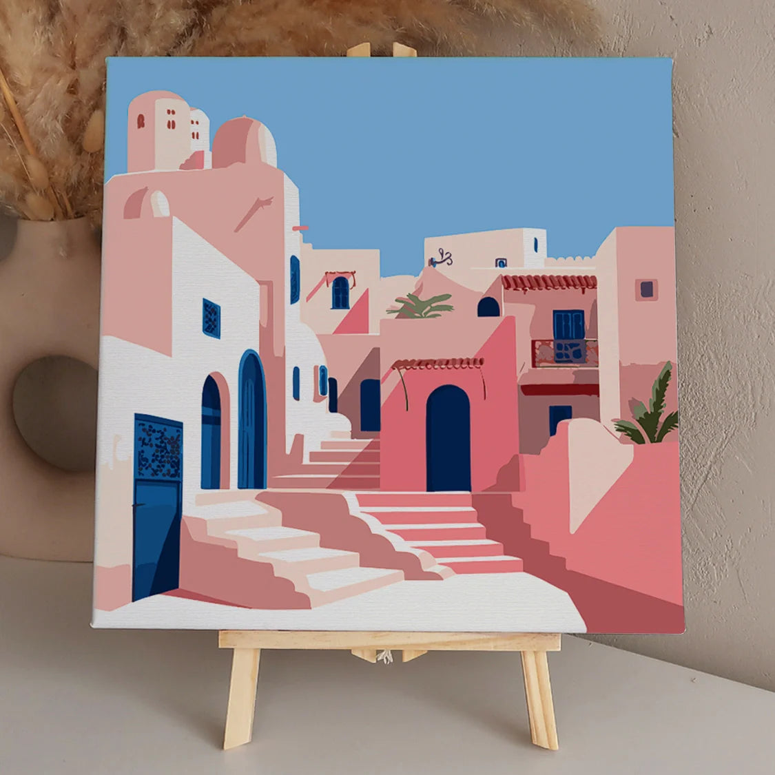 Mediterranean village with pastel buildings, blue doors, and stairs