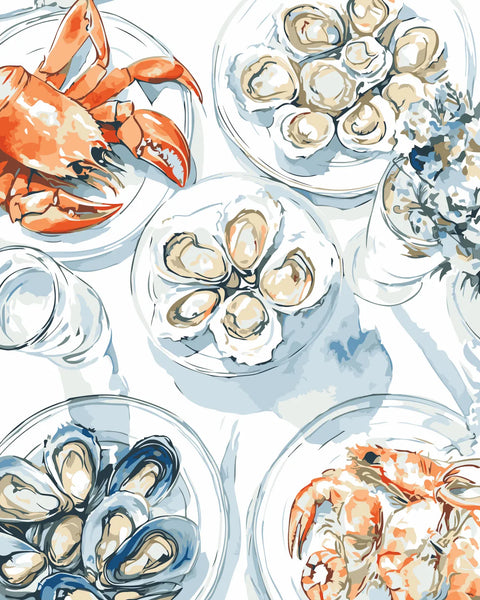 Elegant seafood platter with oysters, crab, and shellfish on plates