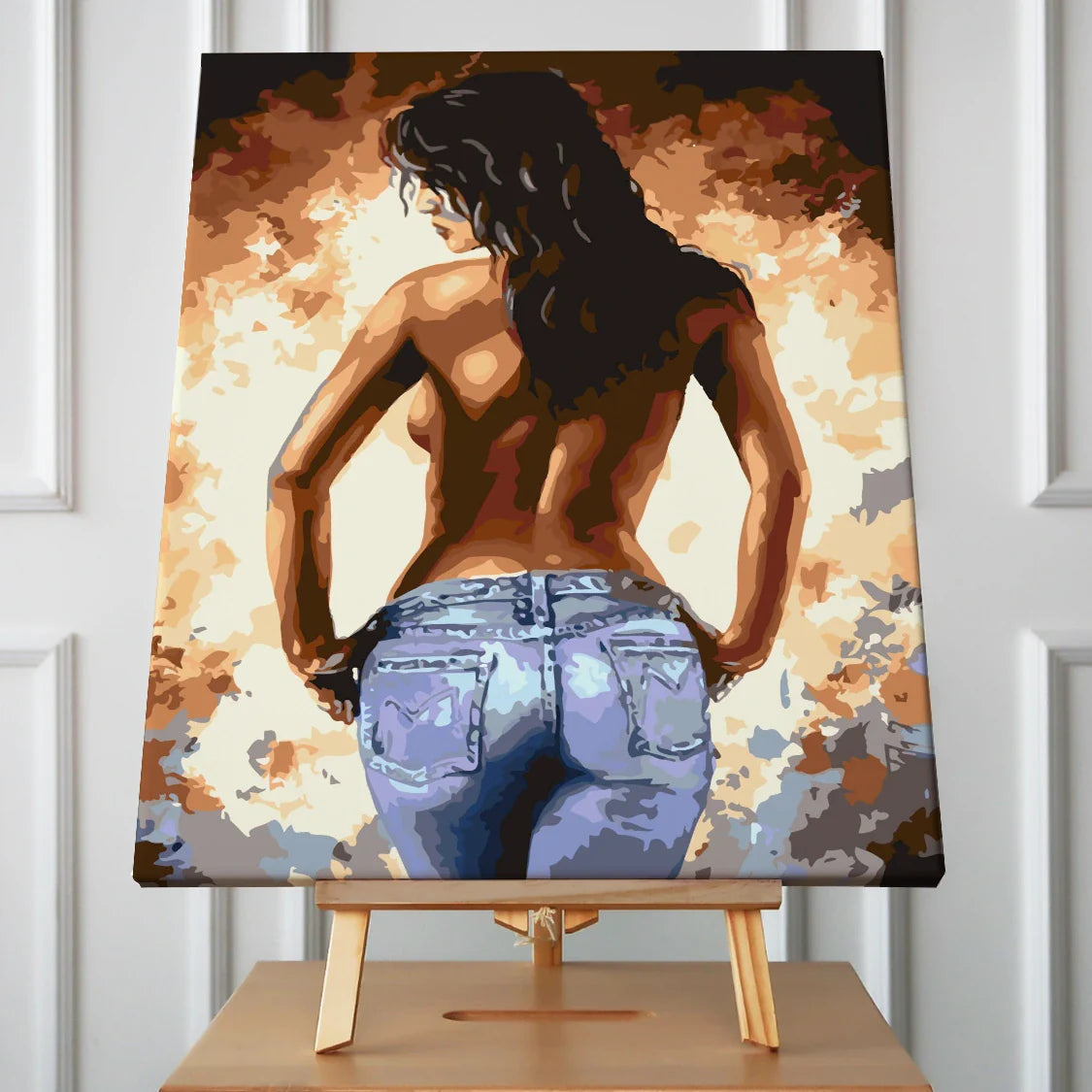 Painting of a topless woman in jeans with a fiery background