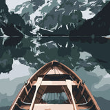 Wooden boat on a calm lake surrounded by mountains