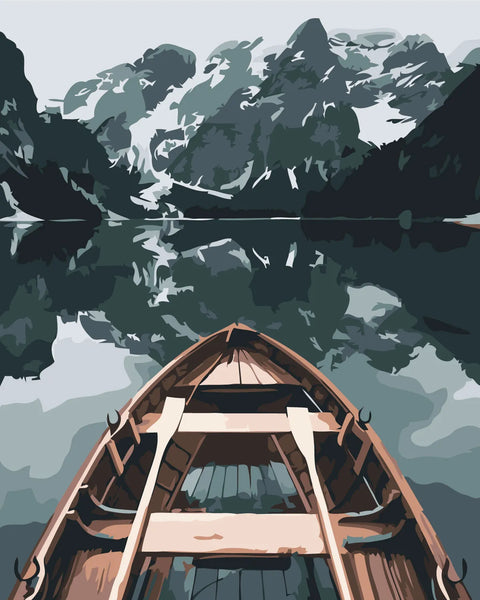 Wooden boat on a calm lake surrounded by mountains