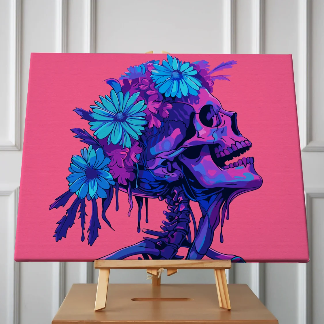 Colorful skull with vibrant flowers on head against pink background