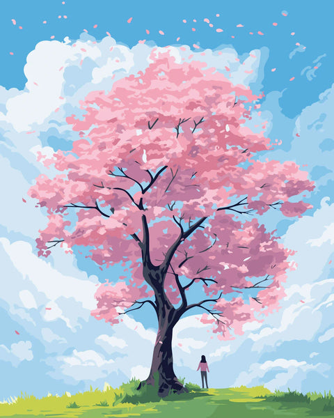 Woman standing under a blooming pink cherry blossom tree