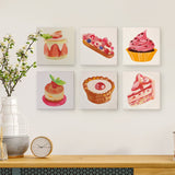 Sugar & Whimsy Paint by Numbers Kit by Artspark with six dessert canvases displayed on a wall.