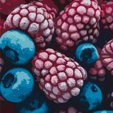 Stylized painting of frozen raspberries and blueberries in vibrant colors